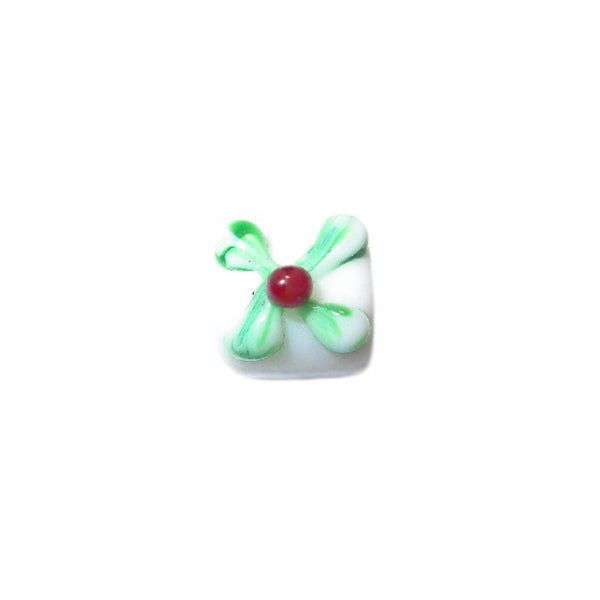 White glassbead with green and red