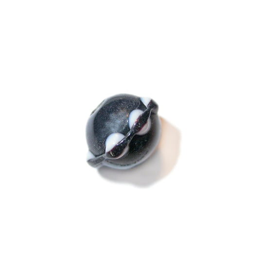 Black glass bead with a collar with white dots