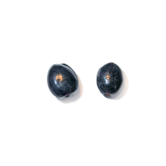 Black, flat rounded glass bead