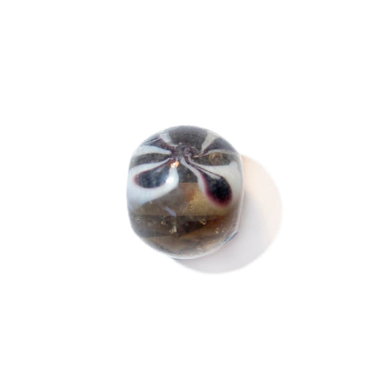 Transparent round glass bead, with black and white inside