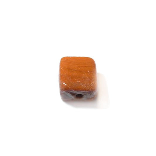 Orange brown, square glass bead