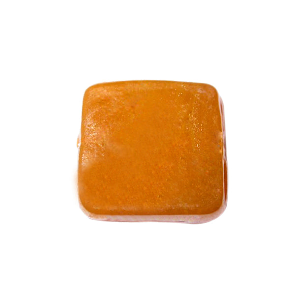 Big light orange, flat, square glass bead