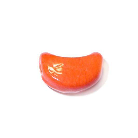 Orange moon form glass bead