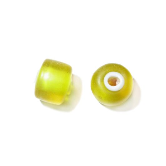 Yellow, halfround, frosted glass bead with white inside