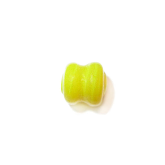 Yellow diabolic bead made of glass