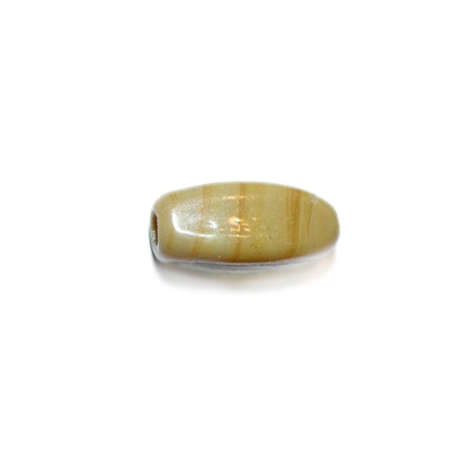 Beige, oblong glass bead with very light stripe