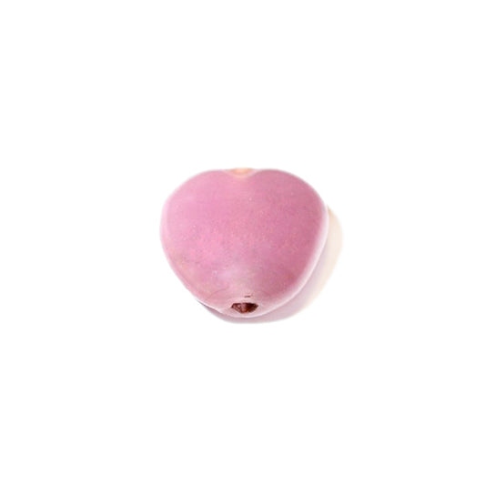 Pink glass bead in heartform