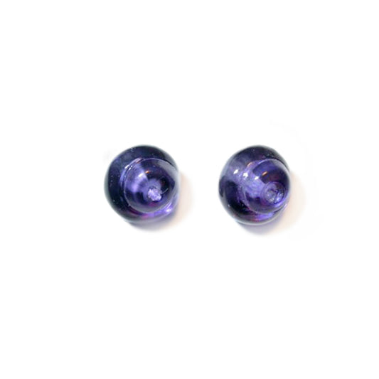 Round, transparent, purple glass bead