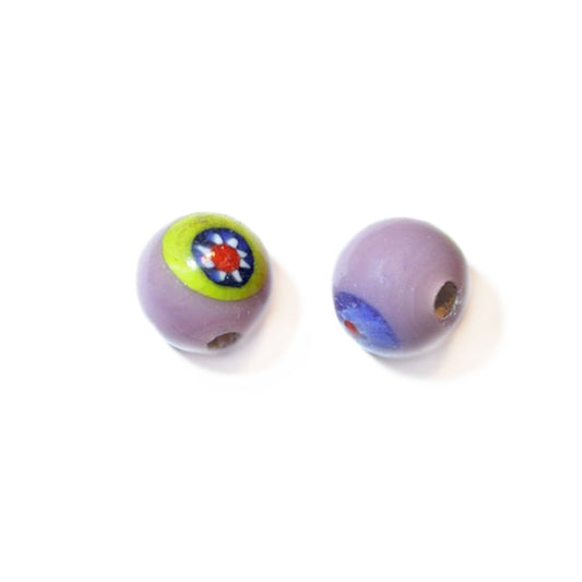 Round, purple glass bead with colors