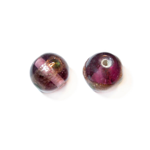 Purple round glass bead with gold colored stripe