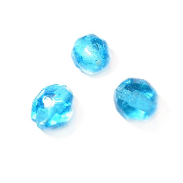 Blue glassbead; light bicone form