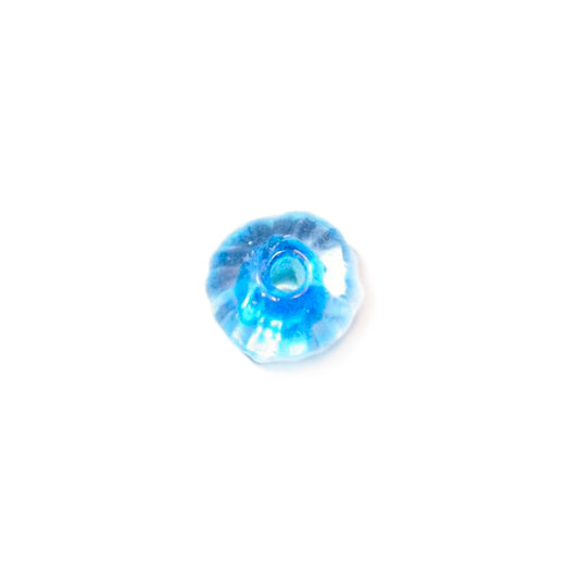 Transparent glass bead with blue inside