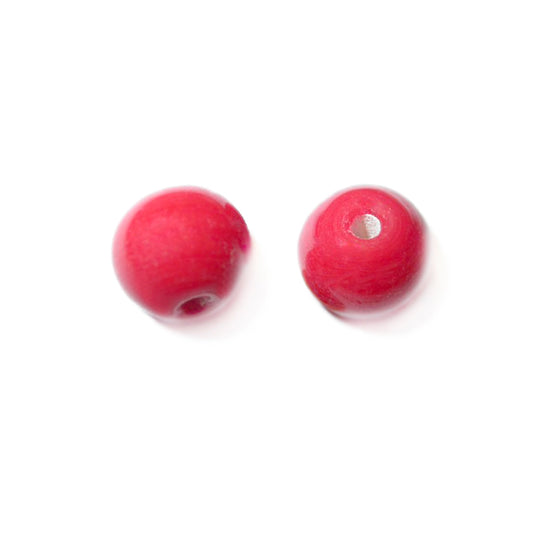 Red, round glass bead