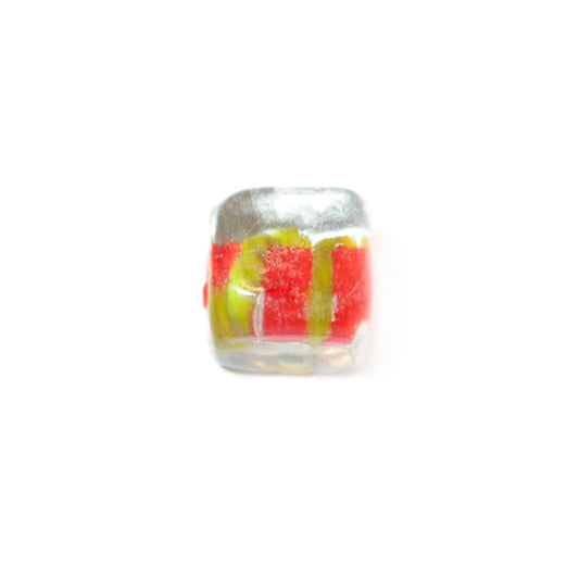 Square, transparent glassbead with red and yellow inside