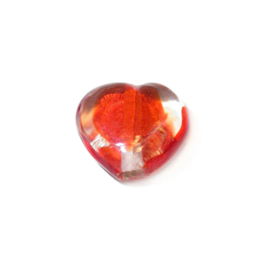 Transparent and red heart made of glass