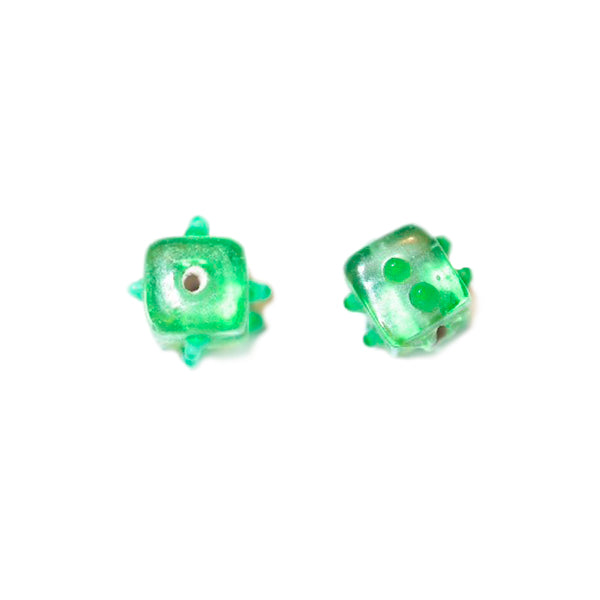 Green square glass bead with dots