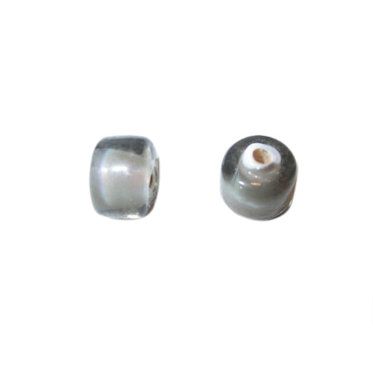 Grey glass bead with white inside