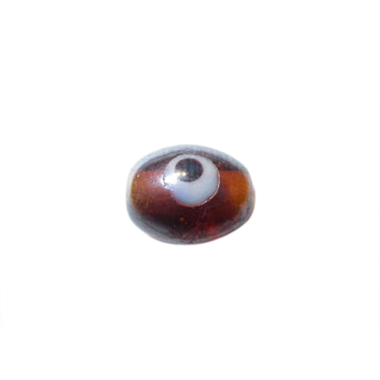 Brown glass bead with white and black