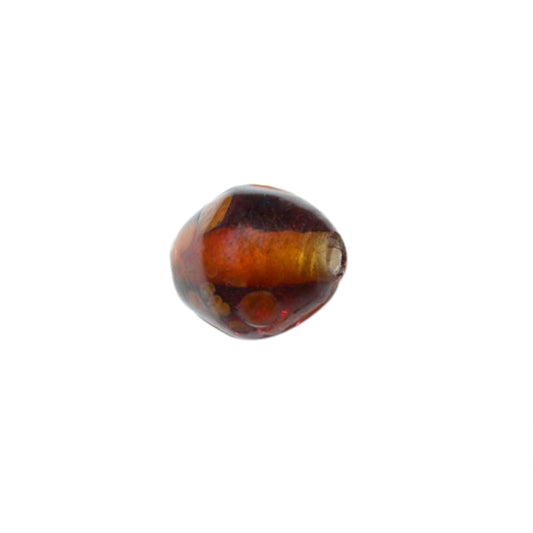 Brown glass bead with spots