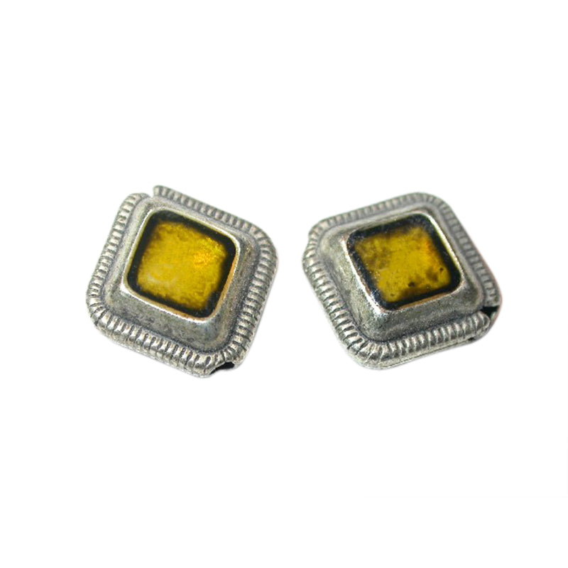 Metal bead with yellow rhinestone