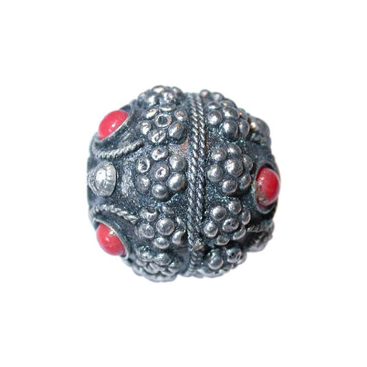 Metal bead, with red stones