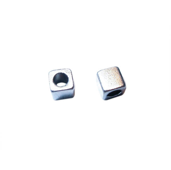 Silver colored metal square bead