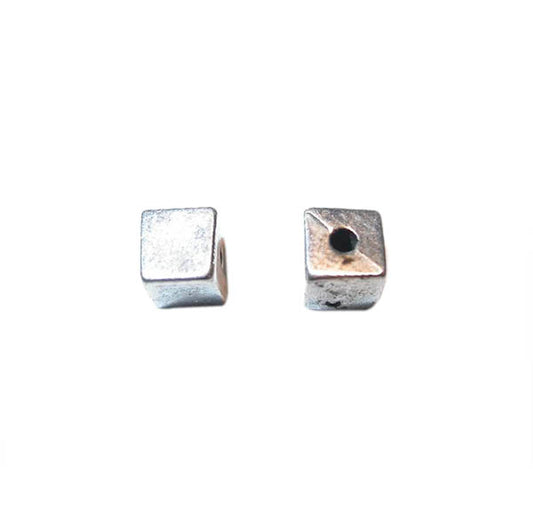 Silver colored square bead