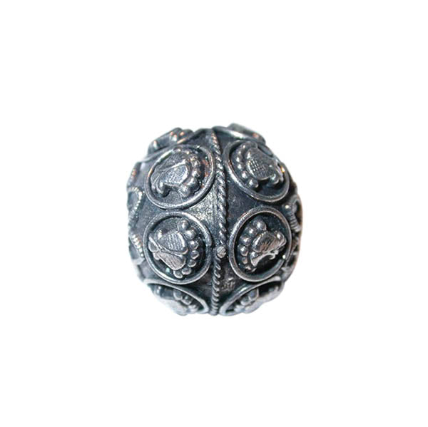 Metal bead, decorated in Indian style