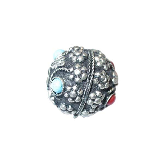 Metal bead with blue and red stones