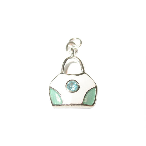 Bag charm made of metal with cream color and light blue