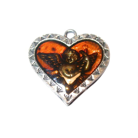 Metal heart with brown epoxy and an angel under it