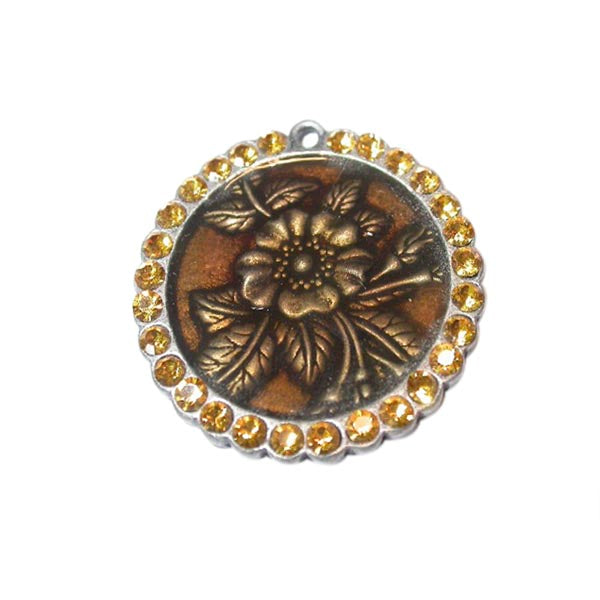 Metal pendant with yellow rhinestones