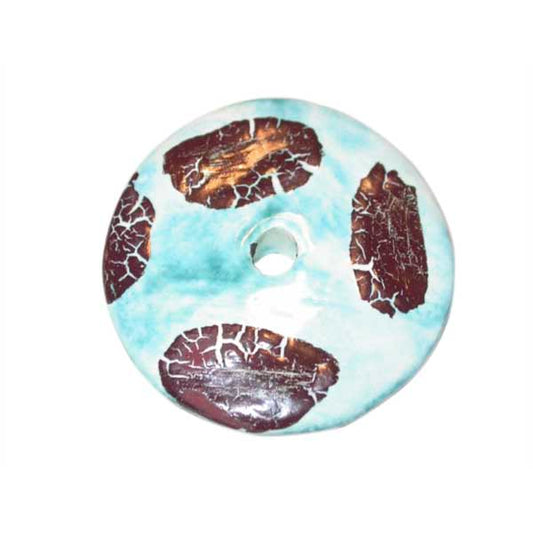Turquoise donut van keramiek