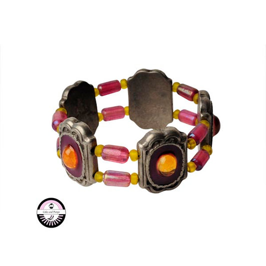 Elastic bracelet made with Metalcoloured beads and yellow and pink glass beads