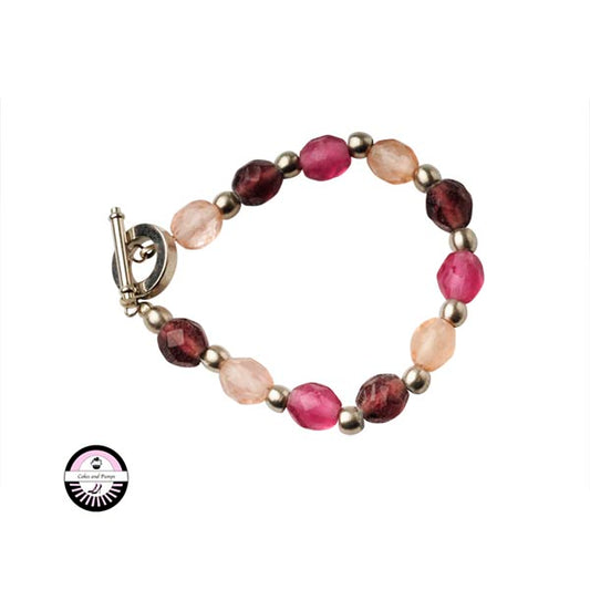 Armband met lichtroze en donkerdere roze glaskralen