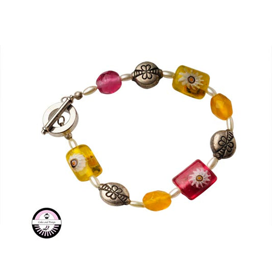 Armband met gele en roze glaskralen